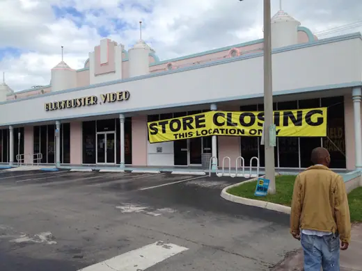 A Blockbuster Video store in Miami Beach, Florida, with closing signage in the windows, November 2013.