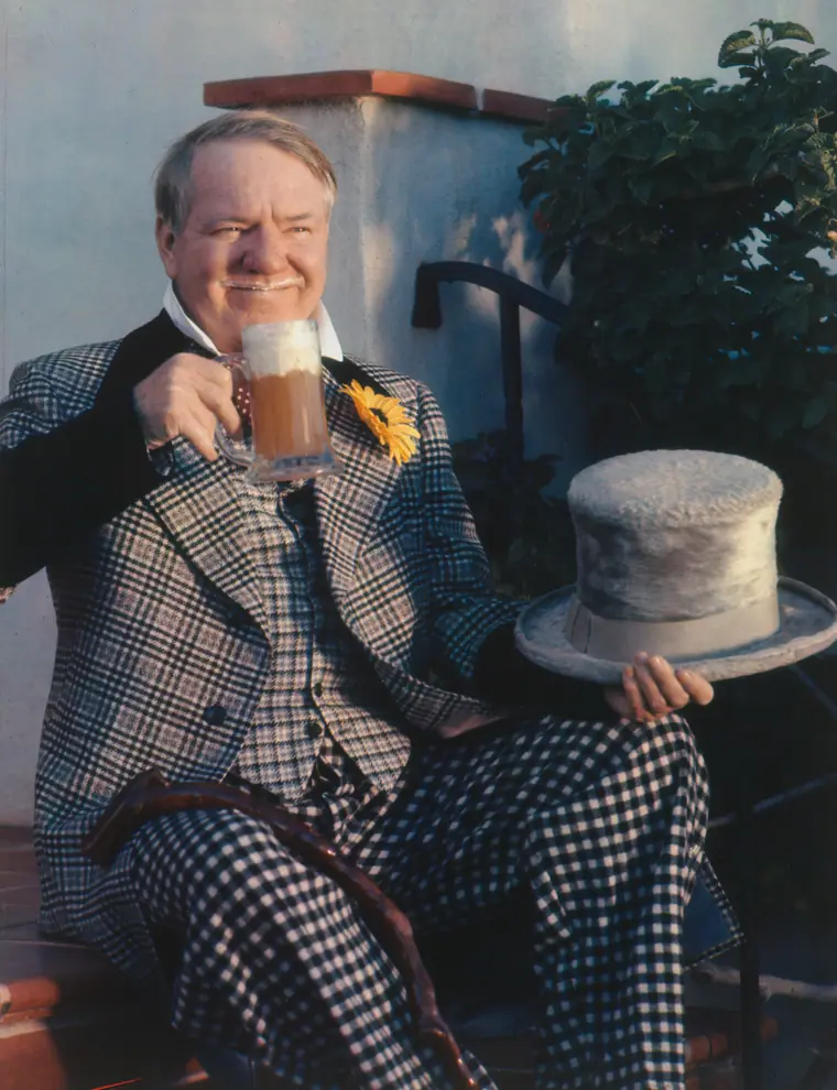 Colour portrait of a comedian in a hat, photographed in 1938.
