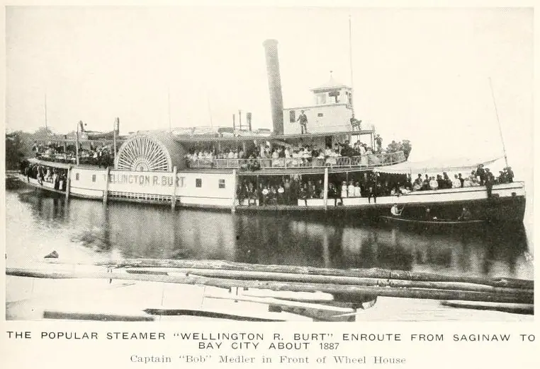 Engraved view of a nineteenth-century sidewheel steamboat under way with smoke trailing from its stack.