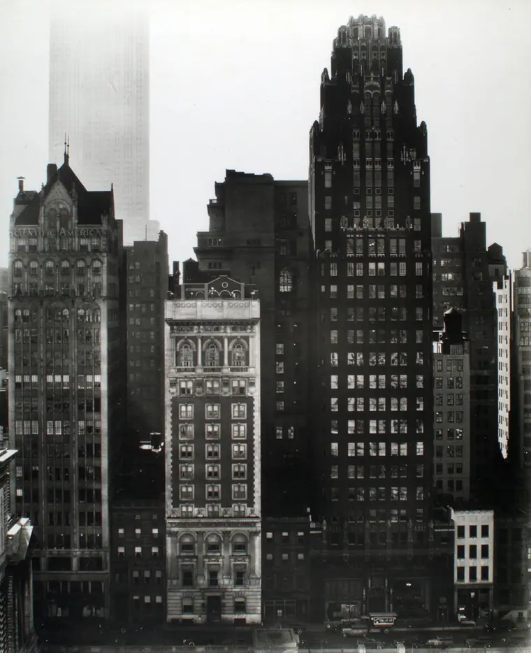 View north from Bryant Park along 40th Street in Manhattan, with the Empire State Building beyond, photographed in 1935.